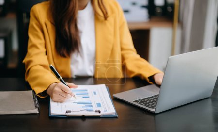 Photo for Businesswoman woman working in the office with laptop - Royalty Free Image