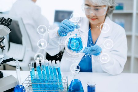 Photo for Doctor working in laboratory, study with virtual icon screen - Royalty Free Image
