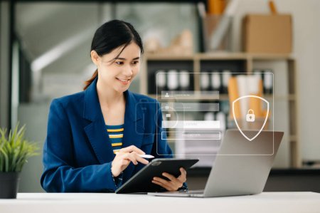 Photo for Cyber security concept, Login, User, identification information security and encryption, secure access to user's personal information woman using tablet in the office - Royalty Free Image