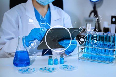 Photo for Scientist mixing chemical liquids in the chemistry lab. Researcher working in the chemical laboratory and new chemical substances with virtual icon - Royalty Free Image