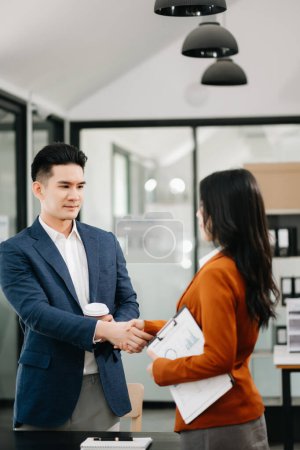 Photo for Business partnership handshake concept.Photo two coworkers handshaking process.Successful deal after great meeting - Royalty Free Image