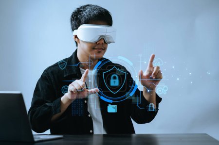 Cybersecurity and privacy concepts to protect data. Lock icon and network security technology. Man protecting personal data with technologies and virtual screen interfaces