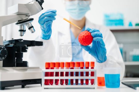 Photo for Modern medical research laboratory. female scientist working with micro pipettes analyzing biochemical samples, advanced science chemical laboratory for medicine. - Royalty Free Image