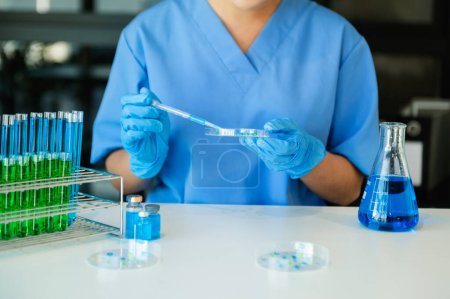 Photo for Doctor working with samples in laboratory - Royalty Free Image