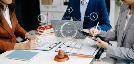 Photo for Business and lawyers discussing contract papers with brass scale on desk in office. Law, legal services, advice,  justice and law concept  with VR icon - Royalty Free Image