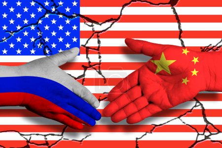 Photo for Two politicians shake hands, China and Russia against the background of a cracked US flag. Partnership concept - Royalty Free Image