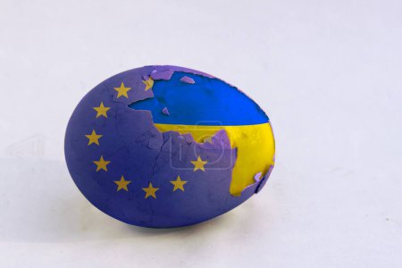 Photo for Chicken egg with the texture of the EU flag. Chicken protein with the texture of the flag of Ukraine. The concept of support and protection of Ukraine by the European Union. - Royalty Free Image