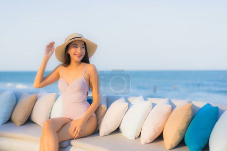 Photo for Portrait beautiful young asian woman happy smile around sea ocean beach and blue sky for leisure travel vacation - Royalty Free Image
