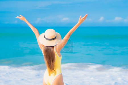 Photo for Portrait beautiful young asian woman relax smile leisure around outdoor tropical sea beach ocean in travel vacation - Royalty Free Image