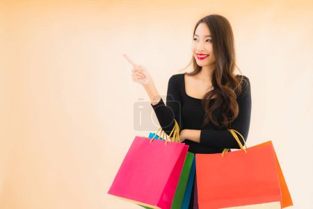 Photo for Portrait beautiful young asian woman with shopping bag from retail and department store - Royalty Free Image
