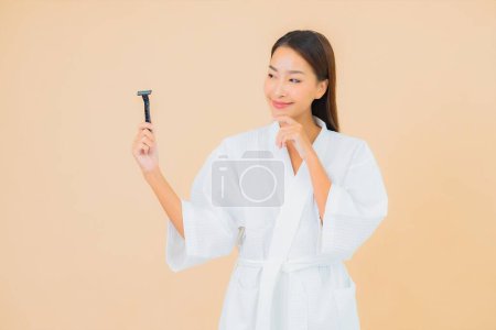 Photo for Portrait beautiful young asian woman with shaving on isolated background - Royalty Free Image