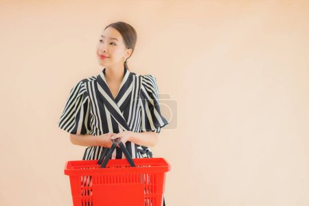 Photo for Portrait beautiful young asian woman with shopping basket for grocery in supermarket - Royalty Free Image