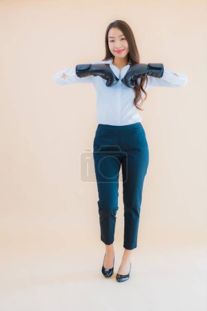 Photo for Portrait beautiful young business asian woman with boxing concept on isolated color background - Royalty Free Image