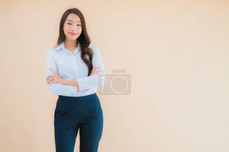 Photo for Portrait beautiful young asian business woman in action on isolated color background - Royalty Free Image
