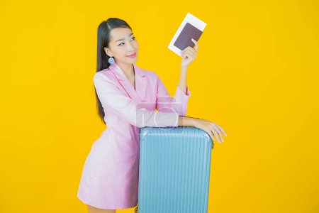 Photo for Portrait beautiful young asian woman with luggage bag and passport ready for travel - Royalty Free Image