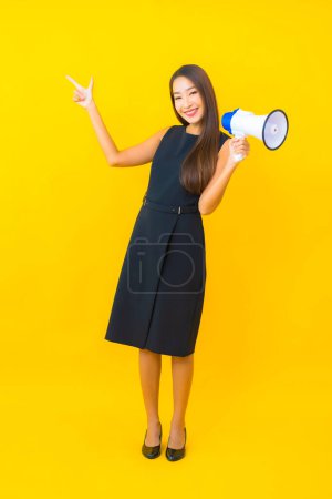 Photo for Portrait beautiful young asian business woman use megaphone for communication - Royalty Free Image