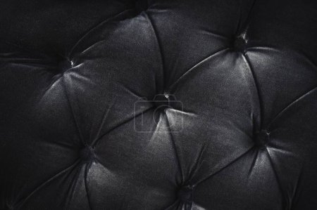 Téléchargez les photos : Coussin matériau noir touffeté fond motif abstrait avec boutons - en image libre de droit