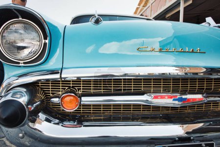 Photo for Close-up front view of the grill and bumper of an aqua marine blue 1950s Chevrolet Belair - Royalty Free Image