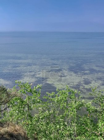 Beauty of Baltic sea. Cristal water. Northern Poland. Puck Bay. Copy space on blue sky.