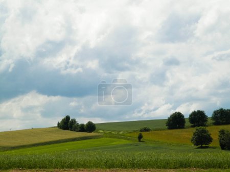 Photo for Beautiful view of hills and meadows of Wiezyca Region, Pomerania, Kashubia, Poland. - Royalty Free Image