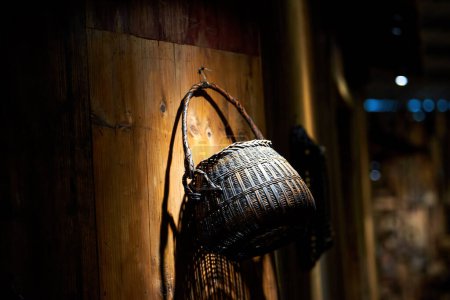 Photo for Chinese traditional woven bamboo baskets hanging in the shop - Royalty Free Image