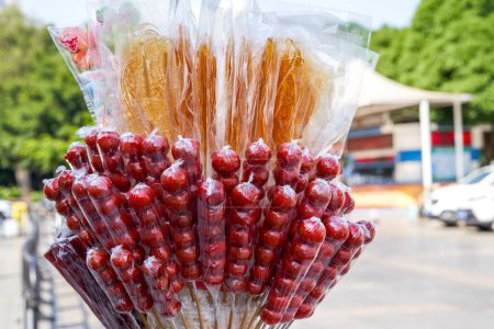 Photo for Closeup of candied haws sold by a street vendor - Royalty Free Image