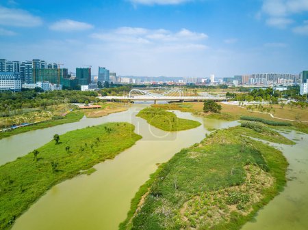 Photo for Aerial photography of a river swamp in a wetland park in a city - Royalty Free Image