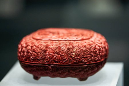 Photo for Closeup of beautifully carved red lacquer box from ancient China - Royalty Free Image