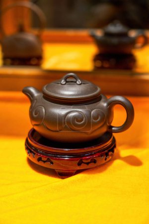 Photo for Traditional Chinese tea set purple clay teapot close-up - Royalty Free Image