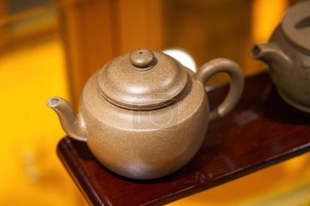 Photo for Traditional Chinese tea set purple clay teapot close-up - Royalty Free Image