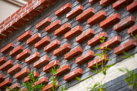 Red brick decorative wall on traditional style building in Chinese commercial district