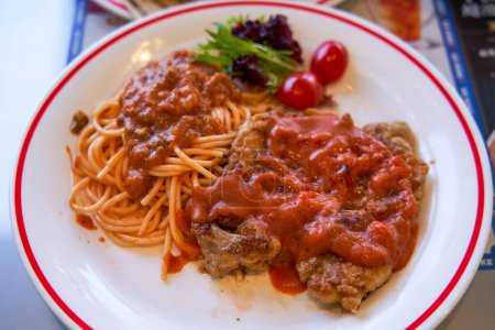 Delicious tomato pork chop with pasta in Hong Kong tea restaurant