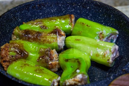 A traditional dish from Guangxi, China, fried and stuffed peppers