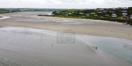 Photo for Inchydoney Beach on a cloudy day, view. Seaside landscape. The famous Irish sandy beach. The coastline of the Atlantic Ocean. - Royalty Free Image