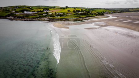 Photo for Inchydoney Beach on a cloudy day. Seaside landscape. The famous Irish sandy beach. The coastline of the Atlantic Ocean. - Royalty Free Image