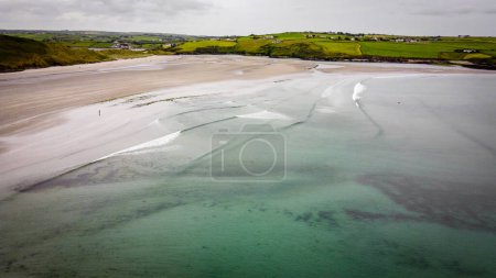 Photo for Inchydoney Beach. Seaside landscape. The famous Irish sandy beach. The coastline of the Atlantic Ocean. - Royalty Free Image