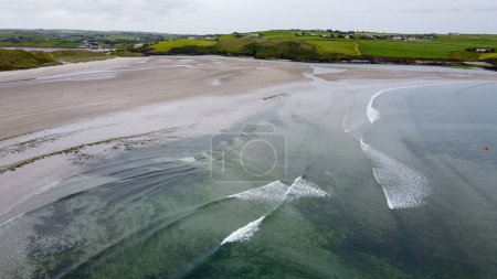 Photo for Inchydoney Beach. Seaside landscape. The Irish sandy beach. The coastline of the Atlantic Ocean. - Royalty Free Image