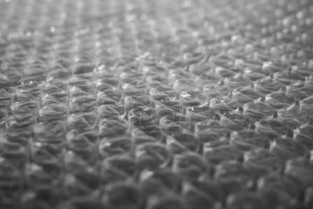 Photo for Bubble Wrap Texture. Close-up of bubble wrap, emphasizing protective packaging. - Royalty Free Image