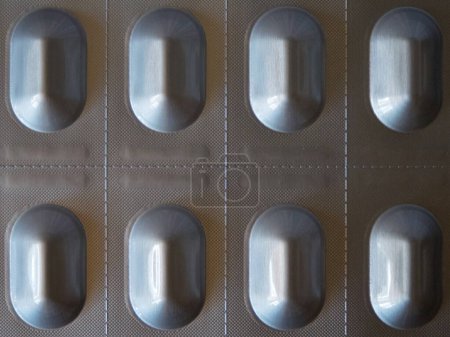 Close-Up of Silver Pills in Blister Pack.