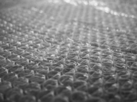 Photo for Packaging Material. Detailed view of bubble wrap on green surface. - Royalty Free Image
