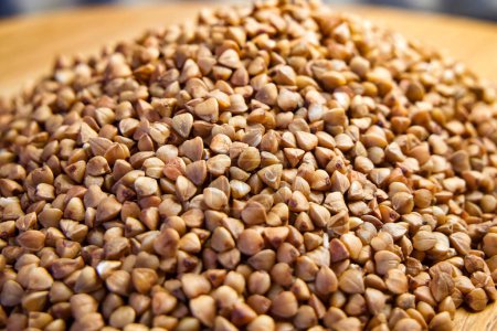 Buckwheat in Soft Focus. Raw buckwheat with a soft focus background, emphasizing the texture of the grains.