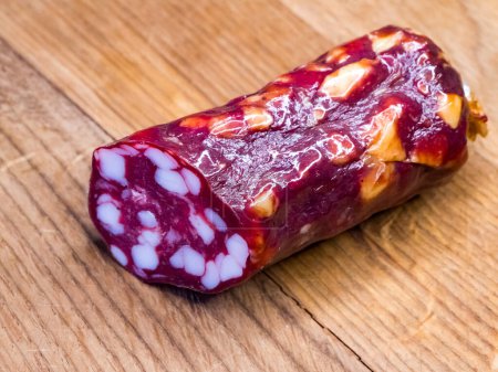 Textured salami, setting a delicious and inviting mood, perfect for food photography portfolios.