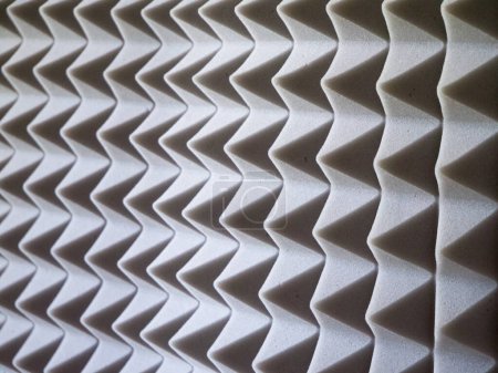 Espuma de reducción de ruido. Textura detallada de espuma acústica gris para estudios.