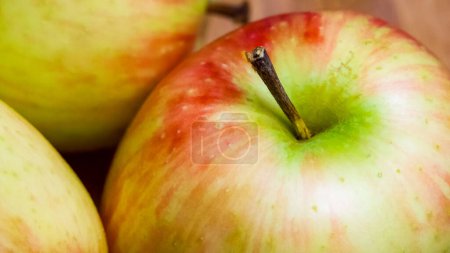 Juicy Apples Variety. A selection of ripe apples, emphasizing their juiciness, ideal for grocery ads.