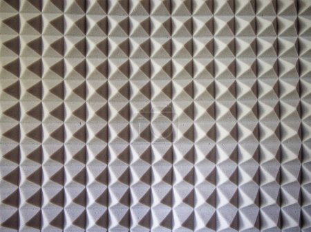 Studio Soundproofing. Acoustic panels with pyramid texture in grey.