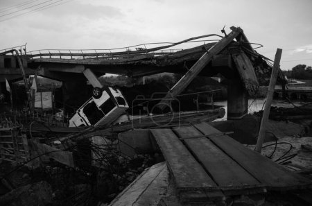 Photo for War in Ukraine. Destroyed bridge in Irpin, Kyiv region after Russian invaders attack. Irpin, Kyiv region, Ukraine, May 2022. Black and white photo - Royalty Free Image