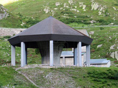 Photo for Gotthard tunnel ventilation shaft (Lueftungsschacht Gotthardtunnel) along the mountain road crossing St. Gotthard in the Swiss Alps, Airolo - Canton of Ticino (Tessin), Switzerland (Schweiz) - Royalty Free Image