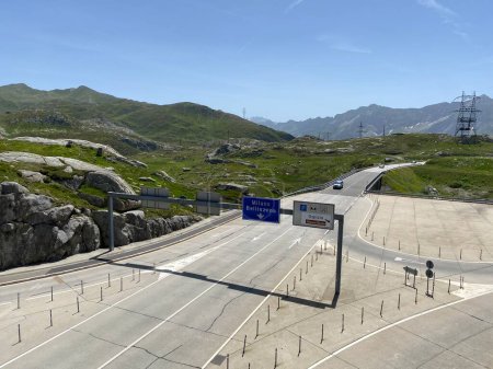 Photo for Mountain road crossing St. Gotthard Pass (Gotthardpass or Passo del Sao Gottardo) in the Swiss Alps, Airolo - Canton of Ticino (Tessin), Switzerland (Schweiz) - Royalty Free Image