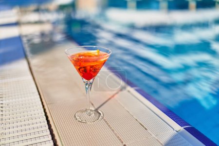 Relaxing vacations with refreshing aperol cocktail by the pool at the all-inclusive resort 