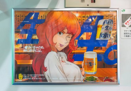Photo for Tokyo, japan - apr 2 2024: Japanese advertising poster of Fujiko Mine woman character from anime and manga Lupin the third making a wink while holding a beer mug to promote a new Suntory alchool drink - Royalty Free Image